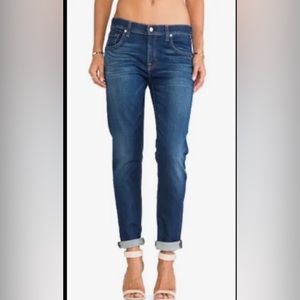 7 for All Mankind.  The relaxed skinny with whiskering & fading distressed look.